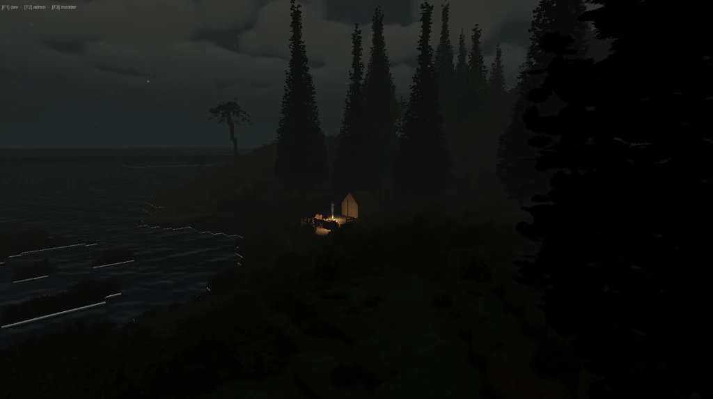 A lit tent and campfire glowing on a dark headland by the water at night, with tall pines behind