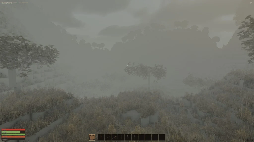 The same varied landscape under dense pale fog and overcast weather